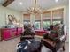 Cozy sitting area with two armchairs and a cowhide ottoman at 548 Double N Rd, Pittsboro, NC 27312