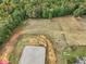 Aerial view of property showing riding arena at 548 Double N Rd, Pittsboro, NC 27312