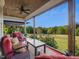 Comfortable seating area on porch overlooking the property at 548 Double N Rd, Pittsboro, NC 27312