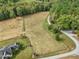 Aerial view of property, including pastures and home at 548 Double N Rd, Pittsboro, NC 27312