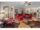 Living room with sectional sofa and hardwood floors at 548 Double N Rd, Pittsboro, NC 27312