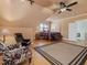 Spacious bedroom with a king-size bed and sitting area at 548 Double N Rd, Pittsboro, NC 27312