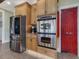 Kitchen features stainless steel appliances and custom wood cabinetry at 548 Double N Rd, Pittsboro, NC 27312