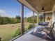 Spacious porch with a view of the pasture and horses at 548 Double N Rd, Pittsboro, NC 27312