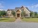 Two-story home with stone accents and landscaping at 548 Double N Rd, Pittsboro, NC 27312