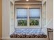 Built-in window seat with a horse-themed cushion and shelves at 548 Double N Rd, Pittsboro, NC 27312