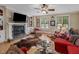Spacious living room features a fireplace, built-in shelving, and hardwood floors at 548 Double N Rd, Pittsboro, NC 27312