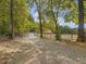 Gravel driveway leading to barn and stables at 548 Double N Rd, Pittsboro, NC 27312