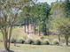 Curving path through a wooded area in a residential community at 15 Brandon Pines Ct, Pittsboro, NC 27312