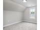 Bonus room featuring sloped ceilings and a window at 45 S Harper Faith Way, Benson, NC 27504