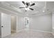 Spacious bedroom with carpet, ceiling fan, and ensuite bathroom access at 45 S Harper Faith Way, Benson, NC 27504