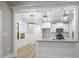 Eat-in kitchen with granite countertops, white cabinets, and stainless steel appliances at 45 S Harper Faith Way, Benson, NC 27504