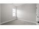 Well-lit bedroom with carpet flooring and a window at 45 S Harper Faith Way, Benson, NC 27504