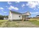 Charming house exterior with a screened porch and landscaped yard at 45 S Harper Faith Way, Benson, NC 27504
