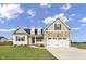 Two-story house with stone and beige siding at 45 S Harper Faith Way, Benson, NC 27504