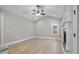 Living room with hardwood floors, vaulted ceiling and fireplace at 45 S Harper Faith Way, Benson, NC 27504