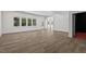 Spacious finished basement with wood-look floors at 488 Colvard Farms Rd, Durham, NC 27713