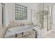 Spa-like bathroom with soaking tub, walk-in shower, and modern fixtures at 488 Colvard Farms Rd, Durham, NC 27713
