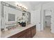 Double vanity bathroom with granite countertops and ample storage at 488 Colvard Farms Rd, Durham, NC 27713