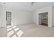 Large bedroom with ceiling fan and access to a private study at 488 Colvard Farms Rd, Durham, NC 27713