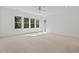 Spacious bedroom with ceiling fan and ample natural light at 488 Colvard Farms Rd, Durham, NC 27713