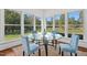 Charming breakfast nook with a glass table and view of the backyard at 488 Colvard Farms Rd, Durham, NC 27713