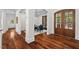 Elegant entryway with hardwood floors and a sitting area at 488 Colvard Farms Rd, Durham, NC 27713