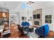 Spacious living room features hardwood floors, stone fireplace, and ample natural light at 488 Colvard Farms Rd, Durham, NC 27713