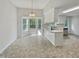 Kitchen dining area with bay window and breakfast bar at 6849 Coventry Ridge Rd, Raleigh, NC 27616