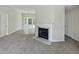 Living room featuring a marble fireplace at 6849 Coventry Ridge Rd, Raleigh, NC 27616