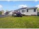 House with deck and fenced-in backyard at 6849 Coventry Ridge Rd, Raleigh, NC 27616