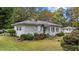 White single story home with landscaped yard at 201 E End Ave, Durham, NC 27703