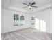 Bright bedroom with carpet flooring, ceiling fan, and large windows at 1724 Red Elm Lane, Homesite 76, Fuquay Varina, NC 27526