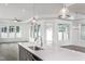 Modern kitchen island with sink and faucet at 1724 Red Elm Lane, Homesite 76, Fuquay Varina, NC 27526