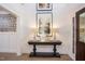 Elegant entryway showcasing a console table, artwork, and hardwood floors at 14 Tant Farm Ln # 09, Zebulon, NC 27597