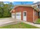 Two-car brick garage with an additional storage room at 3152 87 Hwy, Graham, NC 27253