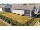 Backyard with screened porch and fence at 495 Bramble Ln, Clayton, NC 27527