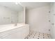 Bathroom with double vanity, large mirror, and tiled floor at 107 Silo Dr, Chapel Hill, NC 27514