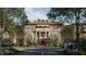 Brick building exterior with parking and landscaping at 2606 Marchmont St # 101, Raleigh, NC 27608