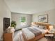 Comfortable bedroom with large bed and plenty of natural light at 232 Pebblestone Dr, Durham, NC 27703