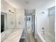 Modern bathroom with a large vanity, soaking tub, and walk-in shower at 232 Pebblestone Dr, Durham, NC 27703