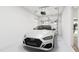 Attached garage with overhead door and space for one car at 708 Portia Way, Homesite 13, Morrisville, NC 27560
