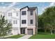 Modern two-story townhome with attached garage and landscaping at 708 Portia Way, Homesite 13, Morrisville, NC 27560