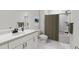 Clean and modern bathroom with a bathtub and shower at 708 Portia Way, Homesite 13, Morrisville, NC 27560