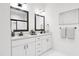 Double vanity bathroom with modern fixtures and an elegant design at 710 Portia Way, Homesite 12, Morrisville, NC 27560