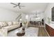 Open living room with a view into the dining area and kitchen at 712 Portia Way, Homesite 11, Morrisville, NC 27560
