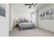 Bright bedroom featuring a queen-size bed and ample natural light at 712 Portia Way, Homesite 11, Morrisville, NC 27560