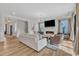 Bright and airy living room with hardwood floors and open floor plan at 616 Silver Comet Dr, Knightdale, NC 27545