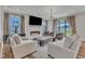Spacious living room featuring a fireplace and large windows at 616 Silver Comet Dr, Knightdale, NC 27545