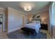 Spacious bedroom with soft color palette, plush bedding, and ample natural light at 1565 Bowers Store Rd, Siler City, NC 27344